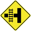 Rail Track Crossing On Side Road Left (Symbolic)